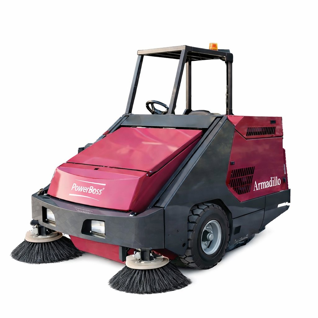PowerBoss Armadillo 9X compact industrial sweeper for narrow aisle warehouse cleaning.